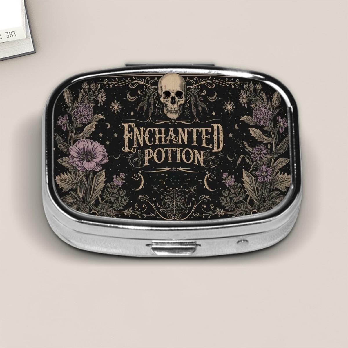 Enchanted Potion Pill Case with Gothic Skull and Floral Art – Witchy Small Pill Box for Purse, Spooky Travel Medicine Organizer Gift